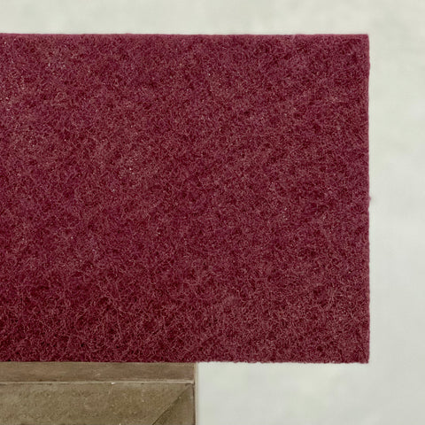 Schleifpad zum feinen Anschleifen und Glätten von Mineralputzoberflächen.